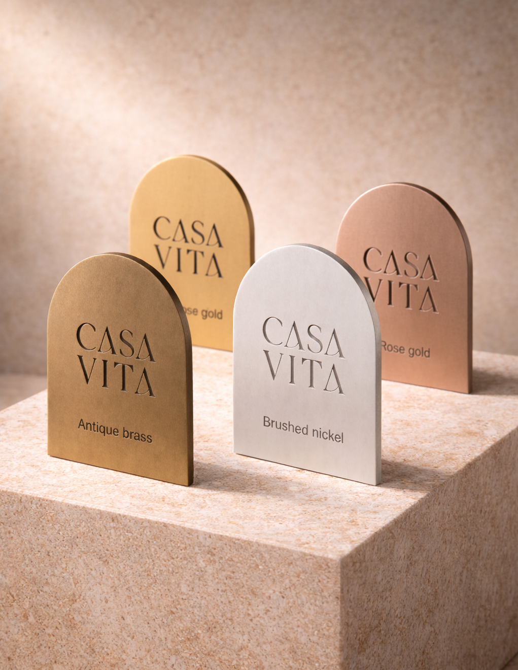 Casa Vita bookends in different finishes on a neutral background