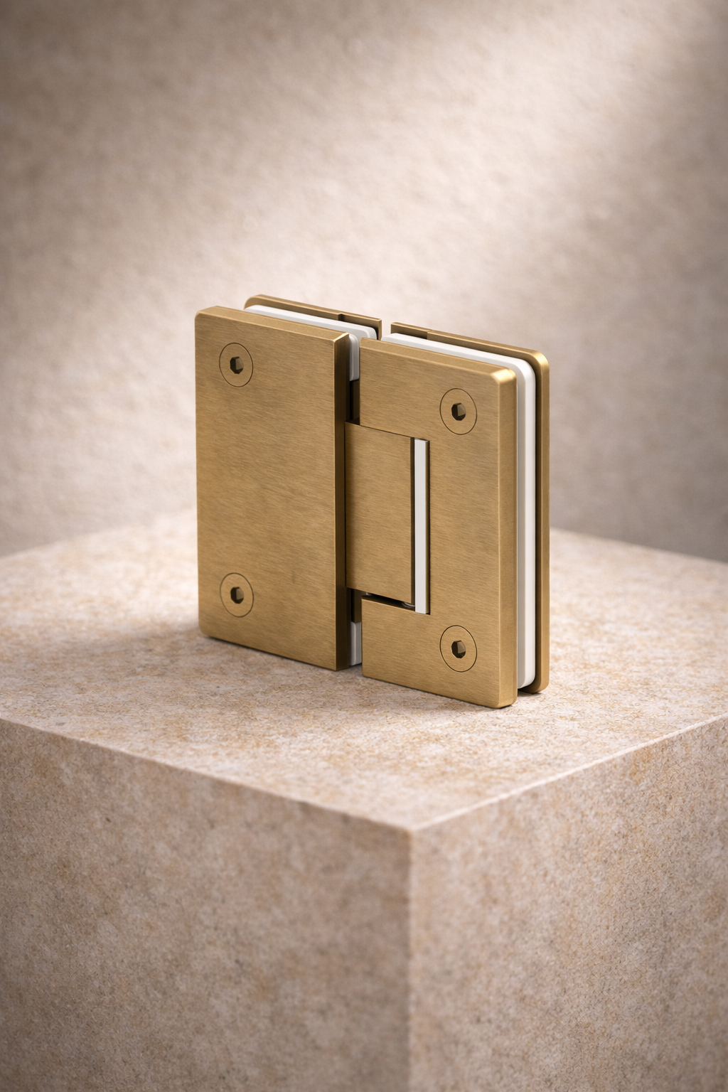 Brass hinge on a neutral background
