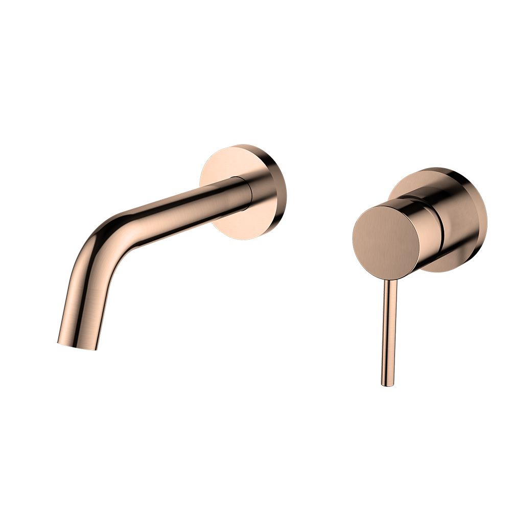 Rose gold bathroom faucet and handle set on a white background