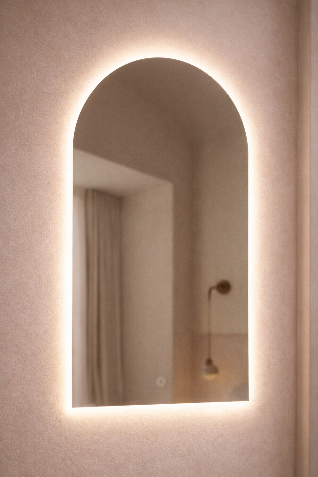 Architectural mirror with illuminated frame on a neutral wall